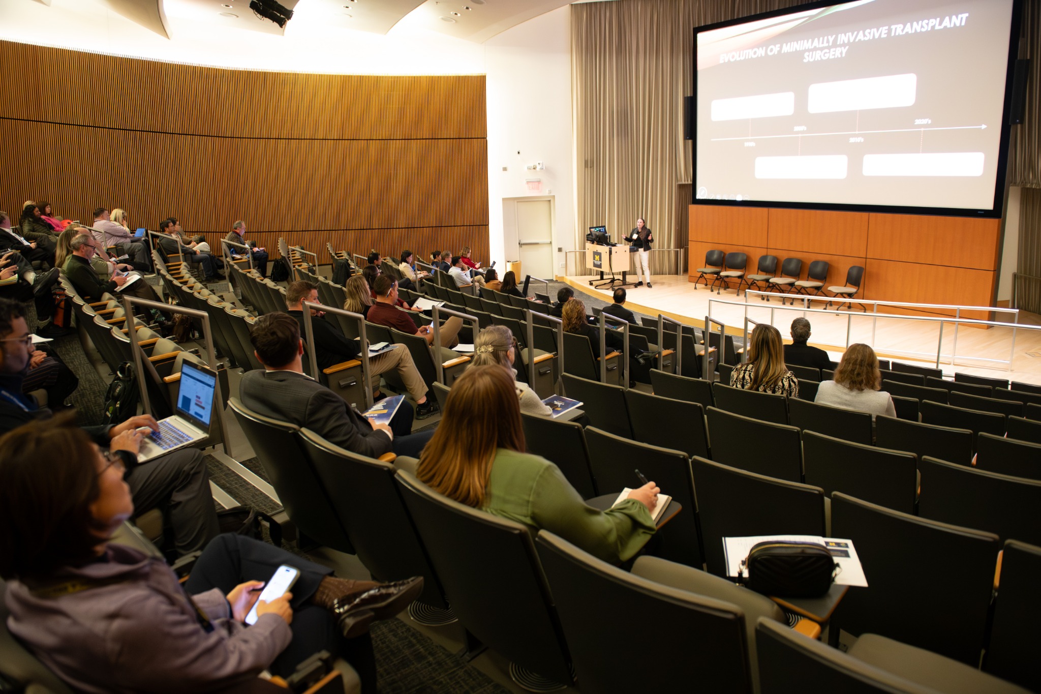 A speaker presenting at the second Transplant Center Research Symposium